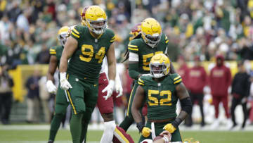 GREEN BAY, WISCONSIN - OCTOBER 24: Rashan Gary #52 of the Green Bay Packers reacts after sacking Taylor Heinicke #4 of the Washington Football Team in the fourth quarter in the game at Lambeau Field on October 24, 2021 in Green Bay, Wisconsin. (Photo by John Fisher/Getty Images)