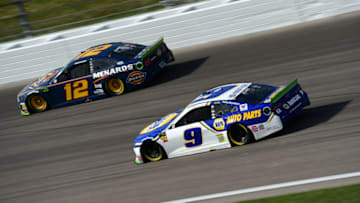 KANSAS CITY, KANSAS - OCTOBER 20: Chase Elliott, driver of the #9 NAPA Auto Parts Chevrolet, races Ryan Blaney, driver of the #12 Menards/Dickies Ford, during the Monster Energy NASCAR Cup Series Hollywood Casino 400 at Kansas Speedway on October 20, 2019 in Kansas City, Kansas. (Photo by Jared C. Tilton/Getty Images)