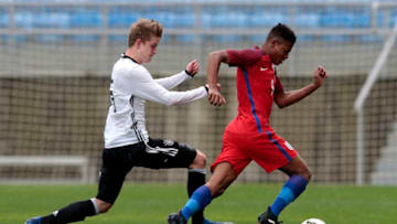 ALBUFEIRA, PORTUGAL - FEBRUARY 12: Rhian Brewster (R) of England U17 challenges Jan Boller (L) of Germany U17 during the U17 Algarve Cup Tournament Match between England U17 and Germany U17 on February 12, 2017 in Albufeira, Portugal. (Photo by Filipe Farinha/Getty Images)