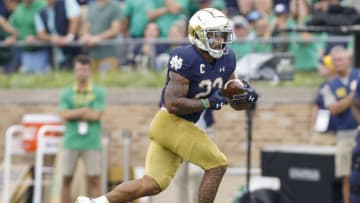 SOUTH BEND, IN - OCTOBER 02: Kyren Williams #23 of the Notre Dame Fighting Irish runs the ball during the game against the Cincinnati Bearcats at Notre Dame Stadium on October 2, 2021 in South Bend, Indiana. (Photo by Michael Hickey/Getty Images)