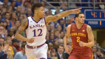Feb 2, 2015; Lawrence, KS, USA; Kansas Jayhawks guard Kelly Oubre Jr. (12) celebrates after scoring during the first half against the Iowa State Cyclones at Allen Fieldhouse. Mandatory Credit: Denny Medley-USA TODAY Sports