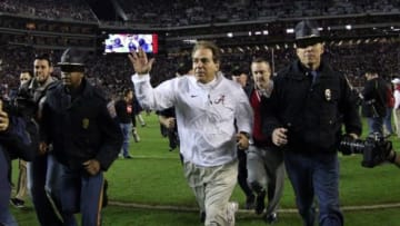 Nov 29, 2014; Tuscaloosa, AL, USA; Alabama Crimson Tide head coach Nick Saban smiles as he leaves the field after defeating the Auburn Tigers 55-44 at Bryant-Denny Stadium. Mandatory Credit: Marvin Gentry-USA TODAY Sports
