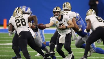 DETROIT, MICHIGAN - OCTOBER 04: Drew Brees #9 of the New Orleans Saints hands off to Latavius Murray #28 while playing the Detroit Lions at Ford Field on October 04, 2020 in Detroit, Michigan. New Orleans won the game 35-29. (Photo by Gregory Shamus/Getty Images)