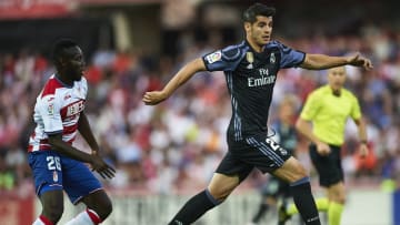 GRANADA, SPAIN - MAY 06: Alvaro Morata of Real Madrid CF (R) competes for the ball with Victorien Angban of Granada CF (L) during the La Liga match between Granada CF v Real Madrid CF at Estadio Nuevo Los Carmenes on May 6, 2017 in Granada, Spain. (Photo by Aitor Alcalde/Getty Images)