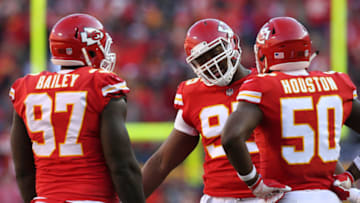 KANSAS CITY, MO - DECEMBER 10: Kansas City Chiefs defensive end Chris Jones (95) with Allen Bailey (97) and Justin Houston (50) during a timeout in the third quarter of an AFC West showdown between the Oakland Raiders and Kansas City Chiefs on December 10, 2017 at Arrowhead Stadium in Kansas City, MO. The Chiefs won 26-15. (Photo by Scott Winters/Icon Sportswire via Getty Images)