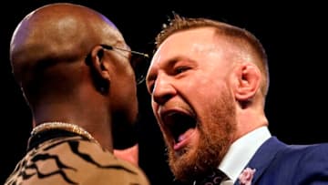 LONDON, ENGLAND - JULY 14: (R-L) Conor McGregor and Floyd Mayweather Jr. face off during the Floyd Mayweather Jr. v Conor McGregor World Press Tour event at SSE Arena on July 14, 2017 in London, England. (Photo by Jeff Bottari/Zuffa LLC/Zuffa LLC via Getty Images)