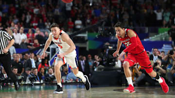 MINNEAPOLIS, MINNESOTA - APRIL 08: Kyle Guy #5 of the Virginia Cavaliers and Davide Moretti #25 of the Texas Tech Red Raiders battle for the ball during the 2019 NCAA men's Final Four National Championship game at U.S. Bank Stadium on April 08, 2019 in Minneapolis, Minnesota. (Photo by Tom Pennington/Getty Images)