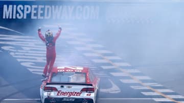 BROOKLYN, MI - AUGUST 13: Kyle Larson, driver of the #42 Target Chevrolet, celebrates winning the Monster Energy NASCAR Cup Series Pure Michigan 400 at Michigan International Speedway on August 13, 2017 in Brooklyn, Michigan. (Photo by Jonathan Ferrey/Getty Images)