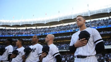 BRONX, NY - OCTOBER 15: Members of the New York Yankees stand for the national anthem prior to Game 3 of the ALCS between the Houston Astros and the New York Yankees at Yankee Stadium on Tuesday, October 15, 2019 in the Bronx borough of New York City. (Photo by Rob Tringali/MLB Photos via Getty Images)