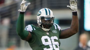 Nov 29, 2015; East Rutherford, NJ, USA; New York Jets defensive end Muhammad Wilkerson (96) reacts to the crowd in the second half of the Jets 38-20 victory over the Miami Dolphins at MetLife Stadium. Mandatory Credit: William Hauser-USA TODAY Sports