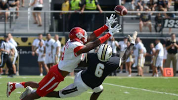 Oct 24, 2015; Orlando, FL, USA; Houston Cougars defensive back William Jackson III (3) and UCF Knights wide receiverTristan Payton (6) dive for the ball during the first half at Bright House Networks Stadium. Mandatory Credit: Jonathan Dyer-USA TODAY Sports
