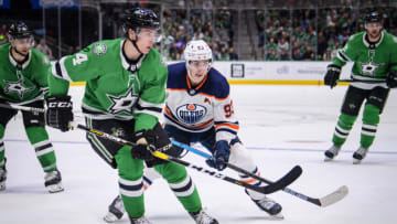 Dallas Stars Miro Heiskanen #4 and Edmonton Oilers center Ryan Nugent-Hopkins #93 Mandatory Credit: Jerome Miron-USA TODAY Sports