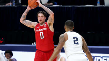 Feb 14, 2021; University Park, Pennsylvania, USA; Nebraska Cornhuskers guard Teddy Allen (0) looks to pass the ball as Penn State Nittany Lions guard Myles Dread (2) defends during the first half at Bryce Jordan Center. Mandatory Credit: Matthew OHaren-USA TODAY Sports