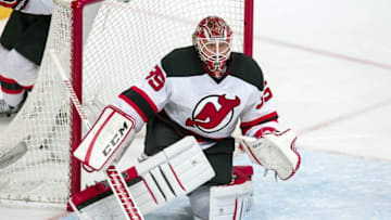 Mar 4, 2016; Dallas, TX, USA; New Jersey Devils goalie Cory Schneider (35) faces the Dallas Stars attack during the first period at the American Airlines Center. Mandatory Credit: Jerome Miron-USA TODAY Sports