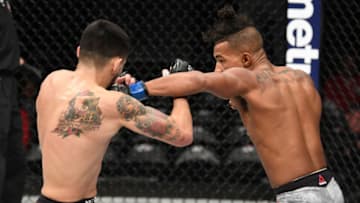 DENVER, CO - NOVEMBER 10: (R-L) Eric Shelton punches Joseph Morales in their flyweight bout during the UFC Fight Night event inside Pepsi Center on November 10, 2018 in Denver, Colorado. (Photo by Josh Hedges/Zuffa LLC/Zuffa LLC via Getty Images)