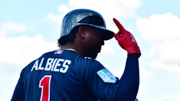 NORTH PORT, FLORIDA - MARCH 24: Ozzie Albies #1 of the Atlanta Braves points before going at-bat at CoolToday Park during a Grapefruit league spring training game against the Tampa Bay Rays on March 24, 2019 in North Port, Florida. (Photo by Julio Aguilar/Getty Images)