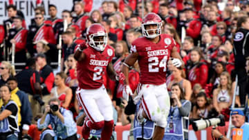 PASADENA, CA - JANUARY 01: Rodney Anderson #24 of the Oklahoma Sooners celebrates after scoring a touchdown making a 21-7 lead in the 2018 College Football Playoff Semifinal Game against the Georgia Bulldogs at the Rose Bowl Game presented by Northwestern Mutual at the Rose Bowl on January 1, 2018 in Pasadena, California. (Photo by Harry How/Getty Images)