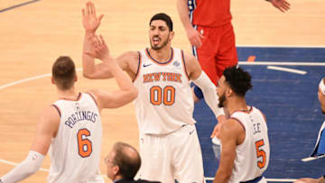 NEW YORK, NY - DECEMBER 25: Kristaps Porzingis #6 and Enes Kanter #00 of the New York Knicks celebrate during the game against the Philadelphia 76ers on December 25, 2017 at Madison Square Garden in New York City, New York. Copyright 2017 NBAE (Photo by Matteo Marchi/NBAE via Getty Images)