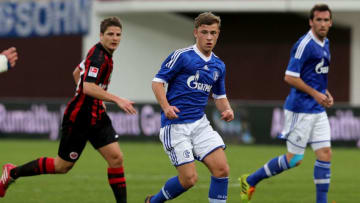 ABU DHABI, UNITED ARAB EMIRATES - JANUARY 11: Max Meyer (C) of Schalke 04 in action during the friendly match between Eintracht Frankfurt and Schalke 04 at the at Al Nahyan Stadium on January 11, 2014 in Abu Dhabi, United Arab Emirates. (Photo by Francois Nel/Getty Images)