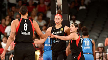 LAS VEGAS, NV - AUGUST 13: Dearica Hamby #5 hi-fives Liz Cambage #8 of the Las Vegas Aces during the game against the Atlanta Dream on August 13, 2019 at the Mandalay Bay Events Center in Las Vegas, Nevada. NOTE TO USER: User expressly acknowledges and agrees that, by downloading and or using this photograph, User is consenting to the terms and conditions of the Getty Images License Agreement. Mandatory Copyright Notice: Copyright 2019 NBAE (Photo by David Becker/NBAE via Getty Images)