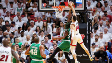 Tyler Herro #14 of the Miami Heat blocks a layup by Marcus Smart #36 of the Boston Celtics(Photo by Michael Reaves/Getty Images)