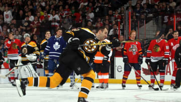 OTTAWA, ON - JANUARY 28: Zdeno Chara #33 of the Boston Bruins and Team Chara in actions against Team Alfredsson during the Blackberry NHL Hardest Shot part of the 2012 Molson Canadian NHL All-Star Skills Competition at Scotiabank Place on January 28, 2012 in Ottawa, Ontario, Canada. (Photo by Bruce Bennett/Getty Images)