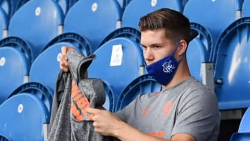 GLASGOW, SCOTLAND - AUGUST 09: New Rangers signing Cedric Itten sits in the stands during the Ladbrokes Scottish Premiership match between Rangers FC and St. Mirren at Ibrox Stadium on August 09, 2020 in Glasgow, Scotland. (Photo by Willie Vass/Pool via Getty Images)