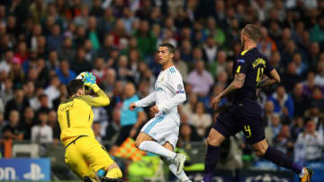 MADRID, SPAIN - OCTOBER 17: Tottenham Hotspur goalkeeper Hugo Lloris makes a save from Cristiano Ronaldo of Real Madrid during the UEFA Champions League group H match between Real Madrid and Tottenham Hotspur at Estadio Santiago Bernabeu on October 17, 2017 in Madrid, Spain. (Photo by Catherine Ivill - AMA/Getty Images)