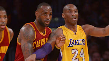 Mar 10, 2016; Los Angeles, CA, USA; Cleveland Cavaliers forward LeBron James (23) and Los Angeles Lakers forward Kobe Bryant (24) battle for position in the first quarter of the game at Staples Center. Mandatory Credit: Jayne Kamin-Oncea-USA TODAY Sports
