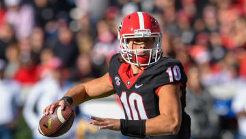 Nov 19, 2016; Athens, GA, USA; Georgia Bulldogs quarterback Jacob Eason (10) passes against the Louisiana-Lafayette Ragin Cajuns during the second half at Sanford Stadium. Georgia defeated Louisiana-Lafayette 35-21. Mandatory Credit: Dale Zanine-USA TODAY Sports