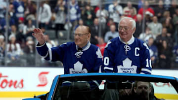 TORONTO, CANADA - FEBRUARY 16: 1963 Stanley Cup Champions Johnny Bower and George Armstrong take to the ice during a ceremony commemorating the 50th anniversary of the team before NHL action at the Air Canada Centre February 16, 2013 in Toronto, Ontario, Canada. (Photo by Abelimages/Getty Images)