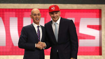 NEW YORK, NY - JUNE 21: Luka Doncic poses with NBA Commissioner Adam Silver after being drafted third overall by the Atlanta Hawks during the 2018 NBA Draft at the Barclays Center on June 21, 2018 in the Brooklyn borough of New York City. NOTE TO USER: User expressly acknowledges and agrees that, by downloading and or using this photograph, User is consenting to the terms and conditions of the Getty Images License Agreement. (Photo by Mike Stobe/Getty Images)