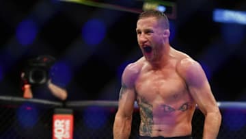 May 9, 2020; Jacksonville, Florida, USA; Justin Gaethje (blue gloves) celebrates after defeating Tony Ferguson (red gloves) during UFC 249 at VyStar Veterans Memorial Arena. Mandatory Credit: Jasen Vinlove-USA TODAY Sports