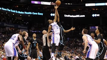 Apr 1, 2016; Charlotte, NC, USA; Philadelphia 76ers guard forward Hollis Thompson (31) and Charlotte Hornets guard Kemba Walker (15) go for a jump ball during the second half of the game at Time Warner Cable Arena. Hornets win 100-91. Mandatory Credit: Sam Sharpe-USA TODAY Sports