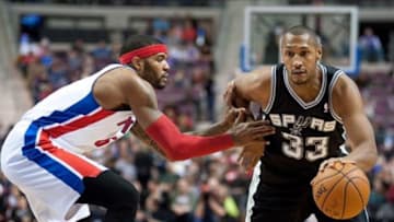 Feb 10, 2014; Auburn Hills, MI, USA; San Antonio Spurs power forward Boris Diaw (33) drives to the basket against Detroit Pistons small forward Josh Smith (6) during the third quarter at The Palace of Auburn Hills. Pistons won 109-100. Mandatory Credit: Tim Fuller-USA TODAY Sports