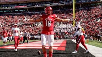 LOUISVILLE, KY - OCTOBER 22: Cole Hikutini #18 of the Louisville Cardinals celebrates after scoring a touchdown during the game against the North Carolina State Wolfpack at Papa John's Cardinal Stadium on October 22, 2016 in Louisville, Kentucky. (Photo by Andy Lyons/Getty Images)