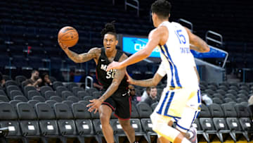 Kyle Allman Jr. #50 of the Miami Heat looks to pass the ball against the Golden State Warrior(Photo by Thearon W. Henderson/Getty Images)