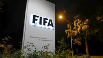 A sign of the FIFA is seen at the entrance of the world football's governing body headquarters on October 13, 2016 in Zurich. / AFP / FABRICE COFFRINI (Photo credit should read FABRICE COFFRINI/AFP/Getty Images)