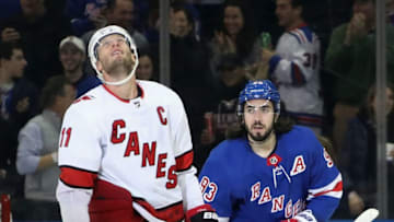 NEW YORK, NEW YORK - NOVEMBER 27: Mika Zibanejad #93 of the New York Rangers celebrates his power-play goal at 2:54 of the first period against the Carolina Hurricanes as Jordan Staal #11 looks up at the scoreboard at Madison Square Garden on November 27, 2019 in New York City. The Rangers defeated the Hurricanes 3-2. (Photo by Bruce Bennett/Getty Images)