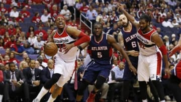 May 9, 2015; Washington, DC, USA; Washington Wizards forward Paul Pierce (34) drives to the basket past Atlanta Hawks forward DeMarre Carroll (5) in the third quarter in game three of the second round of the NBA Playoffs. at Verizon Center. The Wizards won 103-101. Mandatory Credit: Geoff Burke-USA TODAY Sports