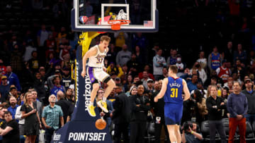 DENVER, CO - APRIL 10: Mac McClung #37 of the Los Angeles Lakers dunks to finish the game against the Denver Nuggets at Ball Arena on April 10, 2022 in Denver, Colorado. NOTE TO USER: User expressly acknowledges and agrees that, by downloading and/or using this Photograph, user is consenting to the terms and conditions of the Getty Images License Agreement. (Photo by Jamie Schwaberow/Getty Images)