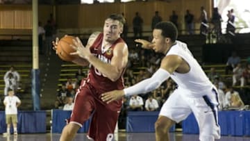 Dec 7, 2015; Honolulu, HI, USA; Oklahoma Sooners forward Ryan Spangler (0) drives to the basket against Villanova Wildcats forward Eric Paschall (4) during the first half at Bloch Arena. Mandatory Credit: Marco Garcia-USA TODAY Sports