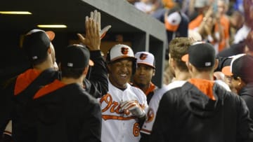 Sep 13, 2015; Baltimore, MD, USA; Baltimore Orioles second baseman Jonathan Schoop (6) celebrates with teammates after hitting a solo home run during the second inning against the Kansas City Royals at Oriole Park at Camden Yards. Mandatory Credit: Tommy Gilligan-USA TODAY Sports