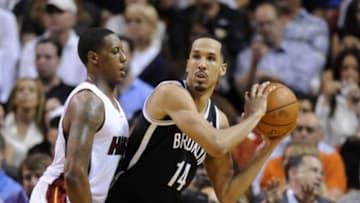 Apr 8, 2014; Miami, FL, USA; Brooklyn Nets guard Shaun Livingston (14) is pressured by Miami Heat guard Mario Chalmers (15) during the second half at American Airlines Arena. The Nets won 88-87. Mandatory Credit: Steve Mitchell-USA TODAY Sports