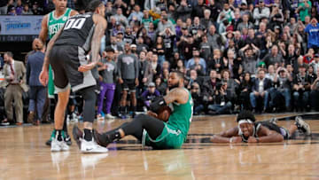 SACRAMENTO, CA - MARCH 6: Marcus Morris #13 of the Boston Celtics holds onto the ball on the floor during the game against the Sacramento Kings on March 6, 2019 at Golden 1 Center in Sacramento, California. NOTE TO USER: User expressly acknowledges and agrees that, by downloading and or using this photograph, User is consenting to the terms and conditions of the Getty Images Agreement. Mandatory Copyright Notice: Copyright 2019 NBAE (Photo by Rocky Widner/NBAE via Getty Images)