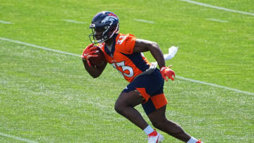 Jun 1, 2021; Englewood, Colorado, USA; Denver Broncos running back Javonte Williams (33) during organized team activities at the UCHealth Training Center. Mandatory Credit: Ron Chenoy-USA TODAY Sports