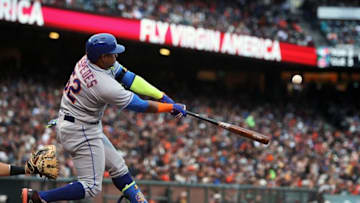 Aug 21, 2016; San Francisco, CA, USA; New York Mets left fielder Yoenis Cespedes (52) hits a two run RBI home run in the seventh inning of their MLB baseball game with the San Francisco Giants at AT&T Park. Mandatory Credit: Lance Iversen-USA TODAY Sports