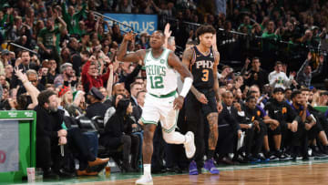 BOSTON, MA - DECEMBER 19: Terry Rozier #12 of the Boston Celtics reacts to made three point basket on December 19, 2018 at the TD Garden in Boston, Massachusetts. NOTE TO USER: User expressly acknowledges and agrees that, by downloading and or using this photograph, User is consenting to the terms and conditions of the Getty Images License Agreement. Mandatory Copyright Notice: Copyright 2018 NBAE (Photo by Brian Babineau/NBAE via Getty Images)