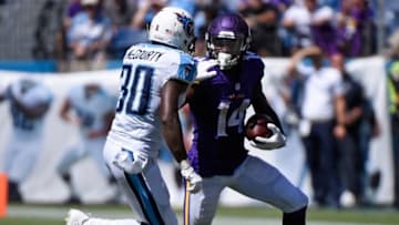 NASHVILLE, TN - SEPTEMBER 11: Jason McCourty #30 of the Tennessee Titans tries to tackle Stefon Diggs #14 of the Minnesota Vikings during the second half at Nissan Stadium on September 11, 2016 in Nashville, Tennessee. (Photo by Frederick Breedon/Getty Images)