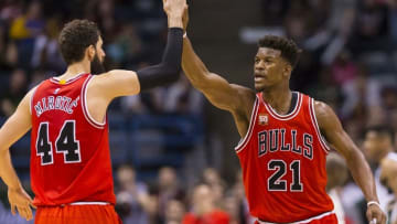 Apr 3, 2016; Milwaukee, WI, USA; Chicago Bulls guard Jimmy Butler (21) celebrates with forward Nikola Mirotic (44) during the fourth quarter against the Milwaukee Bucks at BMO Harris Bradley Center. Chicago won 102-98. Mandatory Credit: Jeff Hanisch-USA TODAY Sports